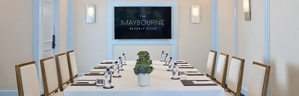 Chairs set up in ballroom for business meeting